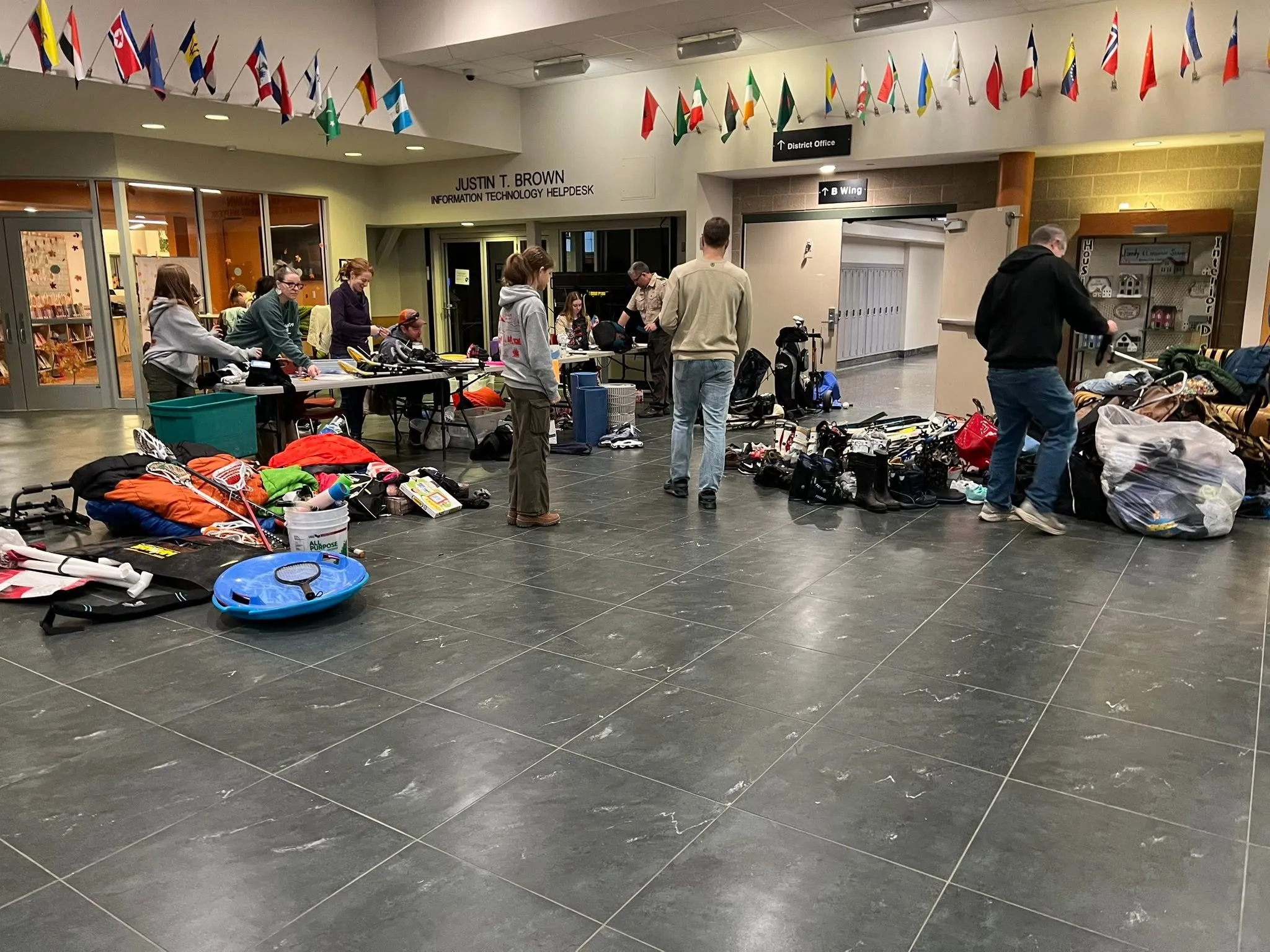 Scouts checking in donated and consigned gear at the morning drop-off